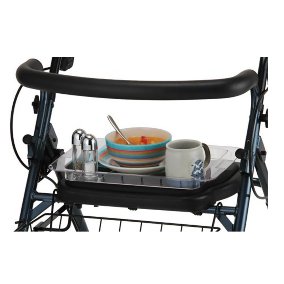 A close-up of the Nova Medical Rollator Tray attached to the frame, holding dishes, a bowl, a mug, and salt and pepper shakers—designed for use with NOVA Mighty Mack or Star DX Rollators for added convenience.